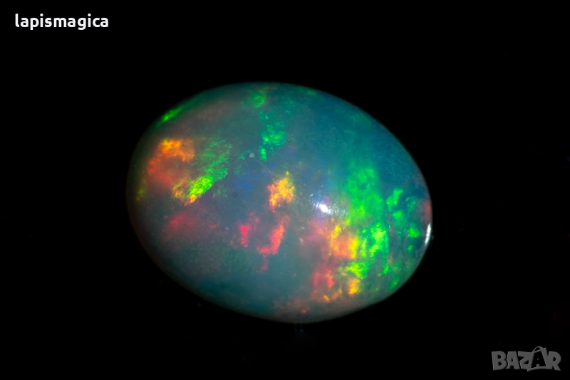 Етиопски опал 1.02ct 9x7mm овален кабошон, снимка 1