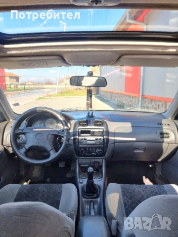 Mazda 323 LPG, снимка 12 - Автомобили и джипове - 53609568