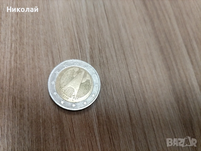 Евро монета от 2 Евро. 