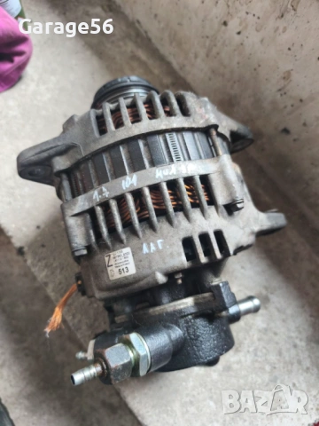 Алтернатор с вакуум помпа Opel Astra H 1.7 