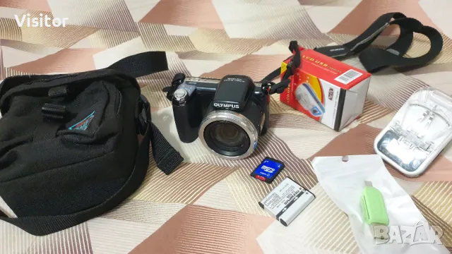 OLYMPUS SP-810UZ 14 mPx, снимка 1 - Фотоапарати - 47199102