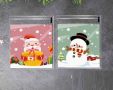50 бр Снежко Коледа коледни прозрачни опаковъчни пликчета торбички за дребни сладки ръчна изработка, снимка 1 - Други - 45080162