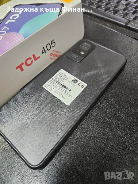 TCL 405 , снимка 1