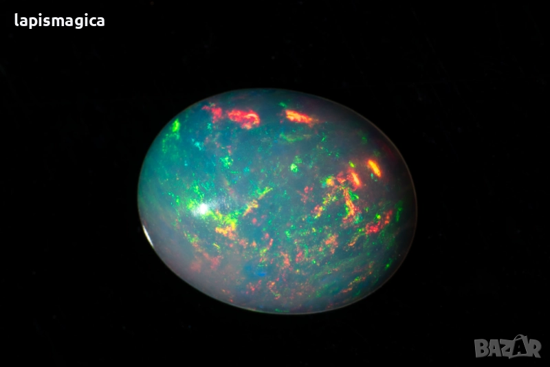 Етиопски опал 0.88ct 9x7mm овален кабошон, снимка 1