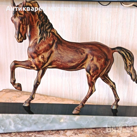 Статуетка на кон