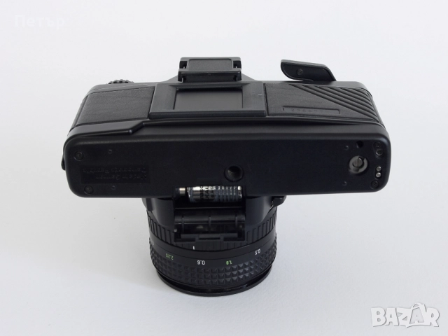 Фотоапарат Praktica BX20 + Pentacon 50mm 1:1.8 + EXACTA VARIOPLAN MC 70-210mm 1:4.0-5.6, снимка 4 - Фотоапарати - 52886758