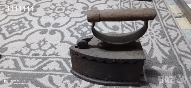 Стара ютия на жар