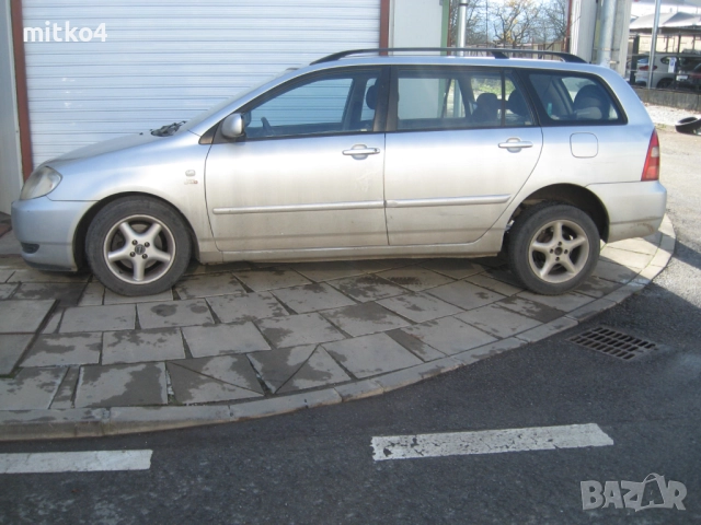 тойота корола 2,0d-4d e12 комби , снимка 8 - Автомобили и джипове - 52598823