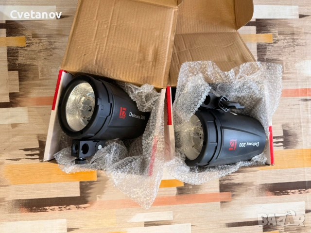 2 броя светкавици Delicacy 200 + 2 броя синхронизатори АС-04