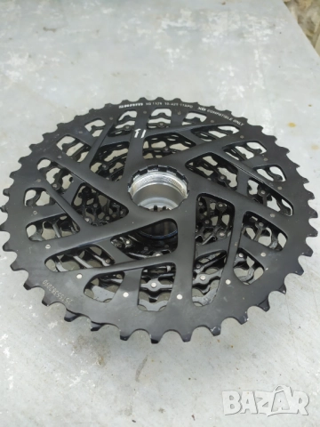 Като нова Венец - касета Sram xg 1275 - 11 speed, снимка 7 - Части за велосипеди - 52078465