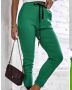 Еластичен панталон в зелено-размер S