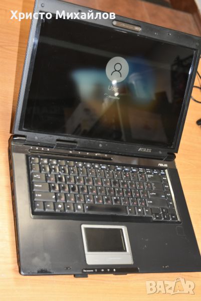 Двуядрен 15,4 инча лаптоп Asus X59GL с Nvidia видео карта, снимка 1