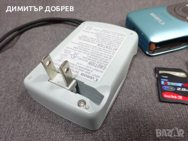 ЦИФРОВ ФОТОАПАРАТ CANON IXUS 105 12,1MP DIGITAL CAMERA, снимка 13 - Фотоапарати - 53946579