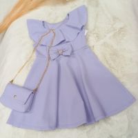 Нежна рокля в лилаво с чанта Размери -4г.6г.8г.10г.12г.14г. Цена -48 лв, снимка 1 - Детски рокли и поли - 45336767