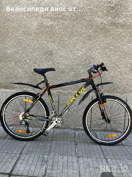 Велосипед колело KELLYS 26 цола 27 скорости всичко е SHIMANO DORE LX много запазено технически Ок , снимка 1