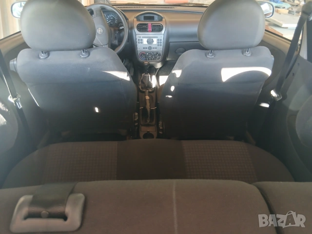Opel corsa 1.3 2005г , снимка 6 - Автомобили и джипове - 54137746
