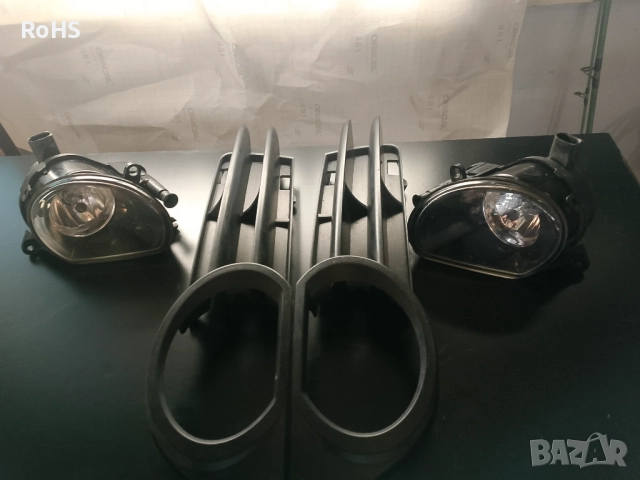 Оригинални халогени HELA за Audi A3 2006+ решетките за бронята.