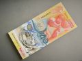 Банкнота - Източни Кариби - 2 долара (юбилейна) UNC | 2023г., снимка 1 - Нумизматика и бонистика - 45694063