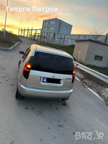Skoda Roomster, снимка 7 - Автомобили и джипове - 53806542