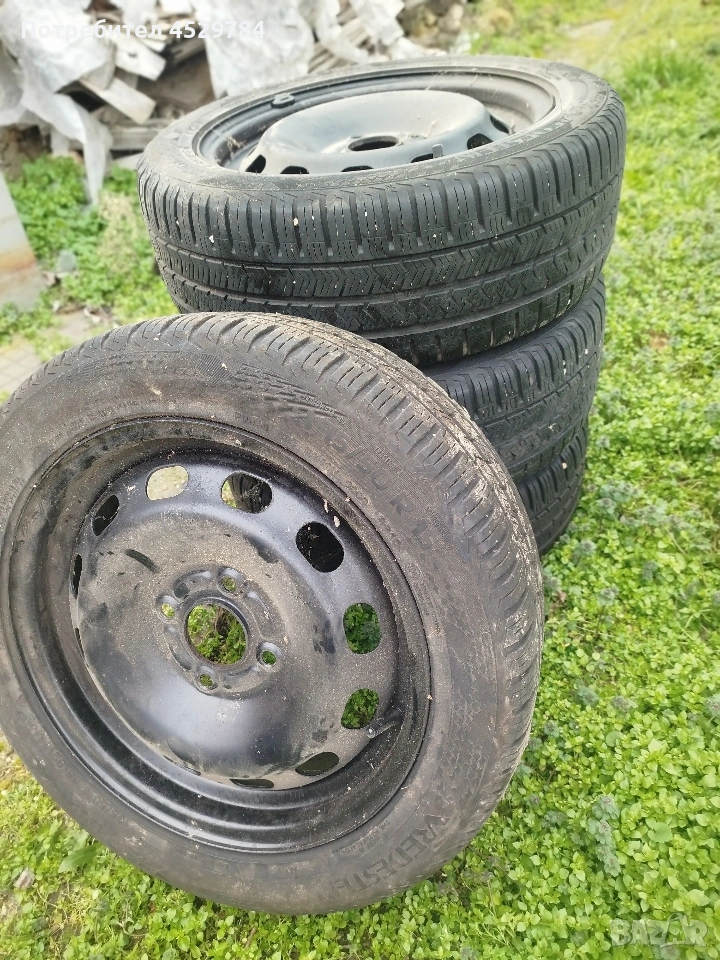 метални джанти за Форд с гуми и оригинални тасове, снимка 1