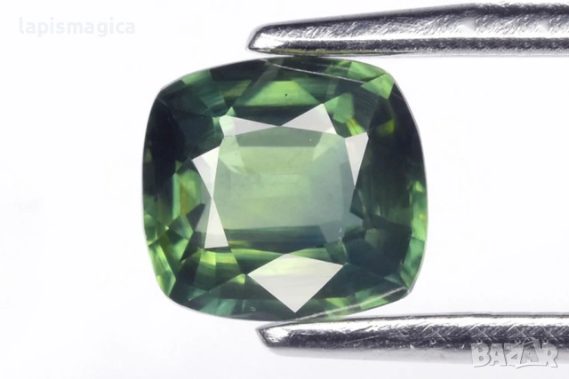 Зелен сапфир от Австралия - нагряван 0.67ct VS cushion шлифовка 5.2x4.8mm