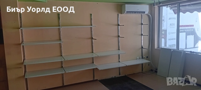 Метални рафтове за стена в магазин или в склад, снимка 2 - Стелажи и щандове - 54138112