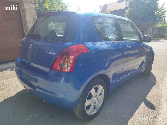 Suzuki Swift 1.3DDIS на (100хил.км.реални) 2009г., снимка 2 - Автомобили и джипове - 46662224