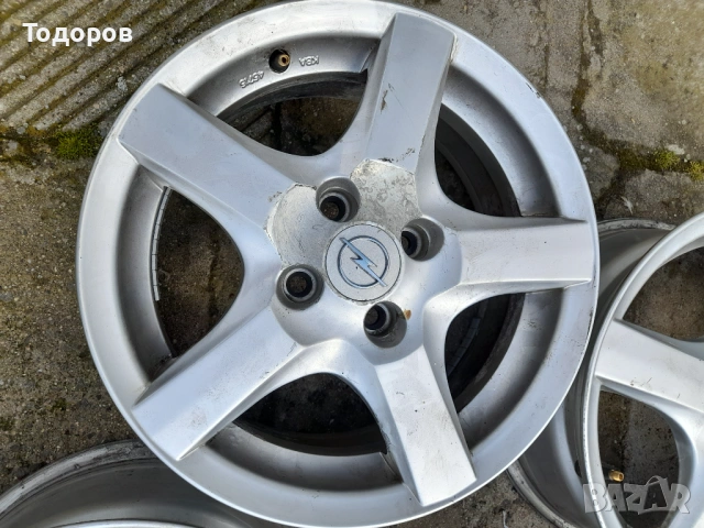 Продава алуминиеви джанти Опел,4х100,15 цола, снимка 2 - Гуми и джанти - 54258968