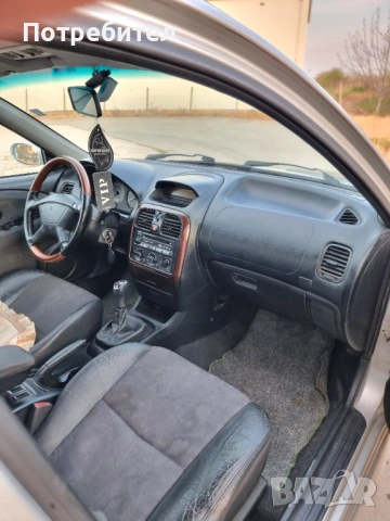 Mitsubishi Carisma , снимка 11 - Автомобили и джипове - 54204330