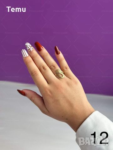 Хубав дамски златист пръстен тип змия от медицинска стомана, снимка 1 - Пръстени - 45852881