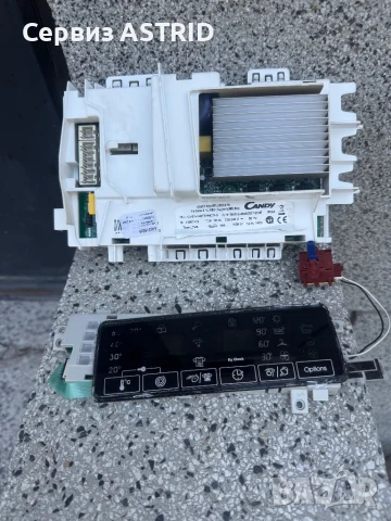 Продавам перфектна управляваща платка и люк (врата) за пералня със сушилня Candy GVSW4465TWHC/2-S