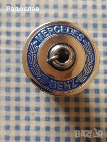 емблема Mercedes - Benz