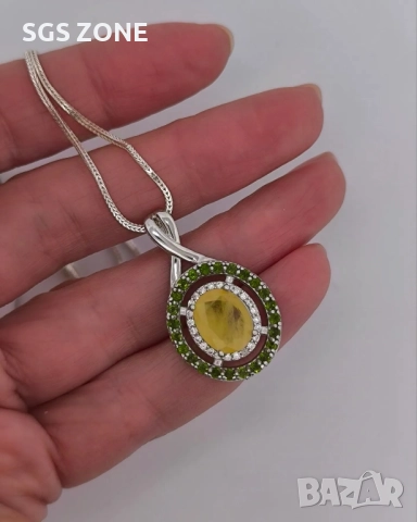 ЛУКСОЗЕН СРЕБЪРЕН ВИСУЛКА С ЖЪЛТ САПФИР, ОБГРАДЕН С ПЕРИДОТ ОТ ТАЙЛАНД