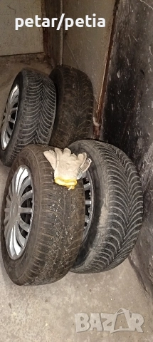 Зимни гуми със джанти Opel Astra 195/65/15, снимка 3 - Гуми и джанти - 52592861