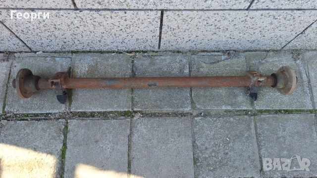 Ос с главини за ремарке