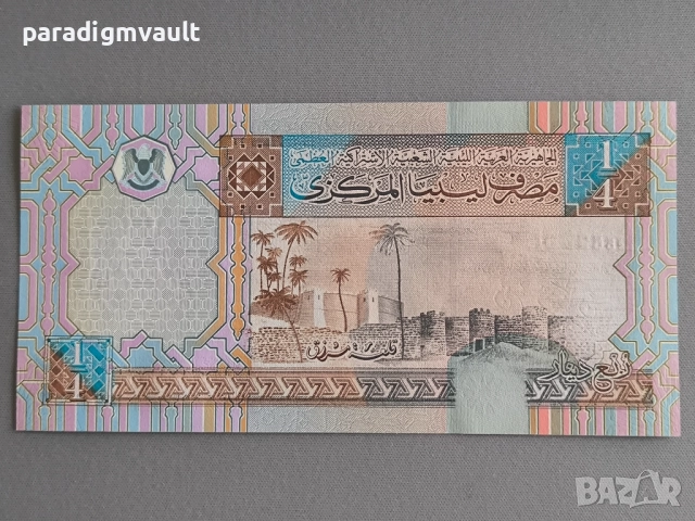 Банкнота - Либия - 1/4 (четвърт) динар UNC | 2002г., снимка 2 - Нумизматика и бонистика - 52070393