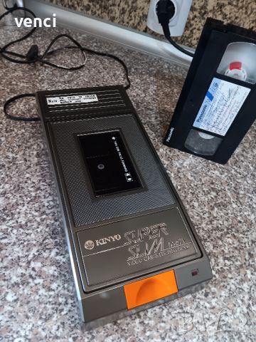 Video cassette rewinder 