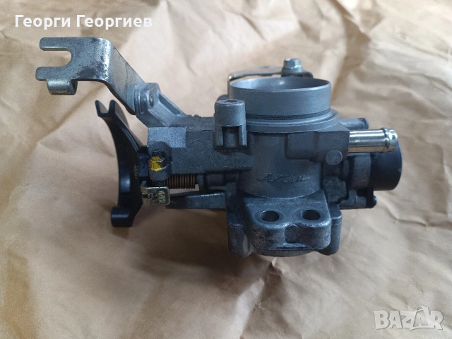 Дросел клапа Daihatsu Sirion 1.3 2005, снимка 6 - Части - 53960543