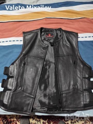 Мото елек чисто нов нее носен ..просто миие много голям..объркан номер