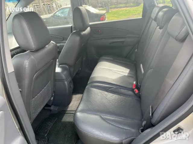 Hyundai Tucson 2.0CRDI, снимка 7 - Автомобили и джипове - 49630051