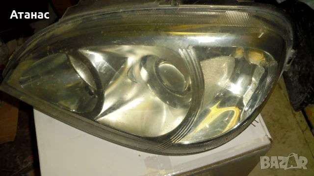 Оригинален ляв фар за Мерцедес МЛ Mercedes Ml. W163 Hella, снимка 2 - Части - 50764356