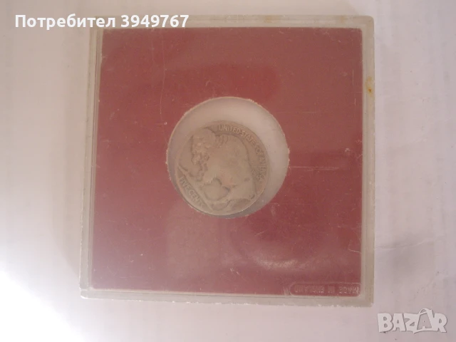 Стара сребърна монета.