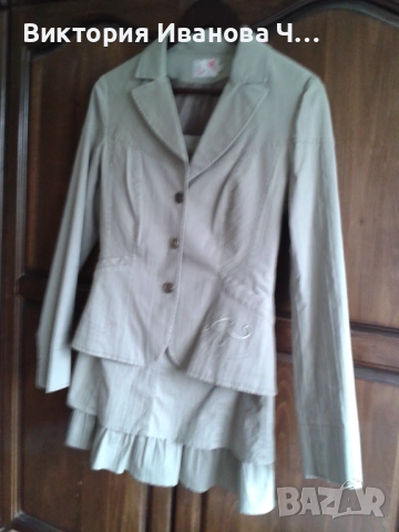 Нов сив  дамски костюм 42н