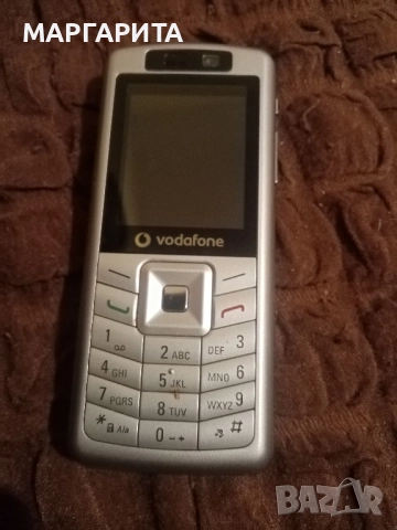 Телефон Водафон с копчета