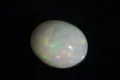 Етиопски опал 2.37ct овален кабошон, снимка 1