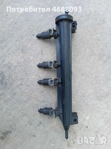 Горивна рейка с дюзи 06А90603iBT за Сеат Толедо 1.6 бензин 102к.с 2005г , снимка 3 - Части - 53008170