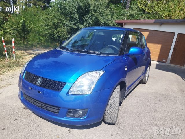 Suzuki Swift 1.3DDIS на (100хил.км.реални) 2009г., снимка 3 - Автомобили и джипове - 46662224