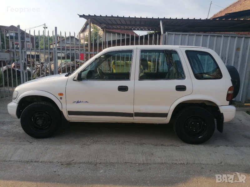 Kia Sportage - 2.0 газ / бензин, снимка 1