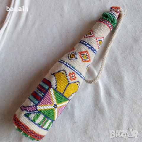 Шише от мъниста.