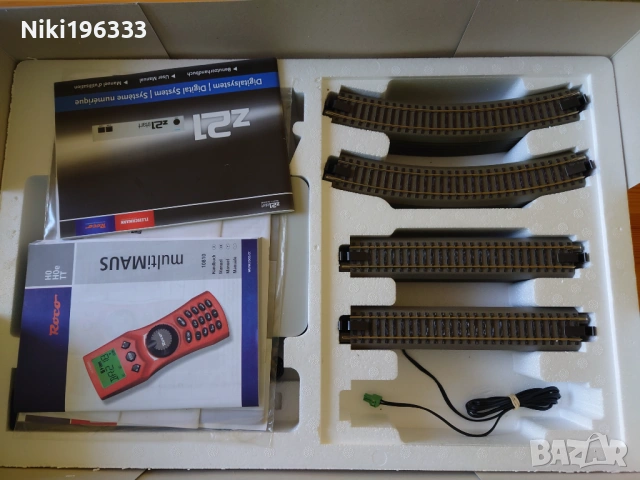 Чисто нов дигитален железопътен стартов комплект Roco z21 (H0) + макет на църква и фигурки, снимка 3 - Други ценни предмети - 53493676